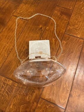 Clear Acrylic football shaped Clutch with Gold Chain Strap purse